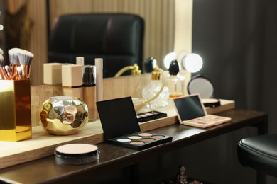 Makeup room. Different beauty products on dressing table indoors
