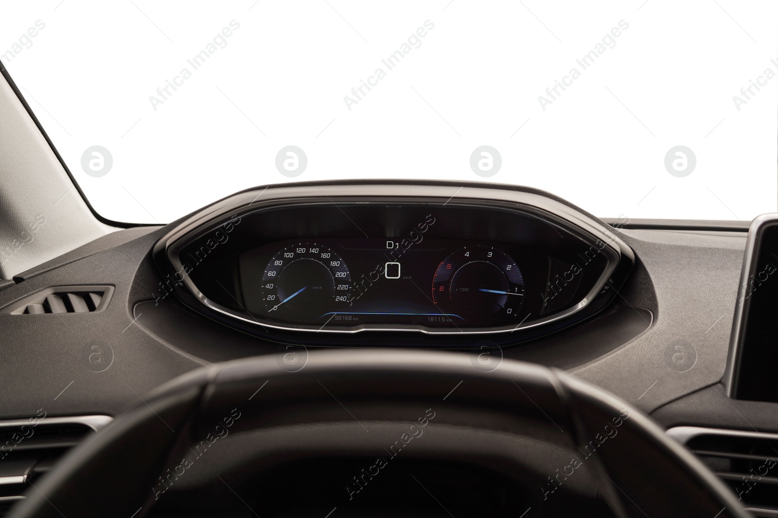 Photo of Speedometer, tachometer and steering wheel inside car