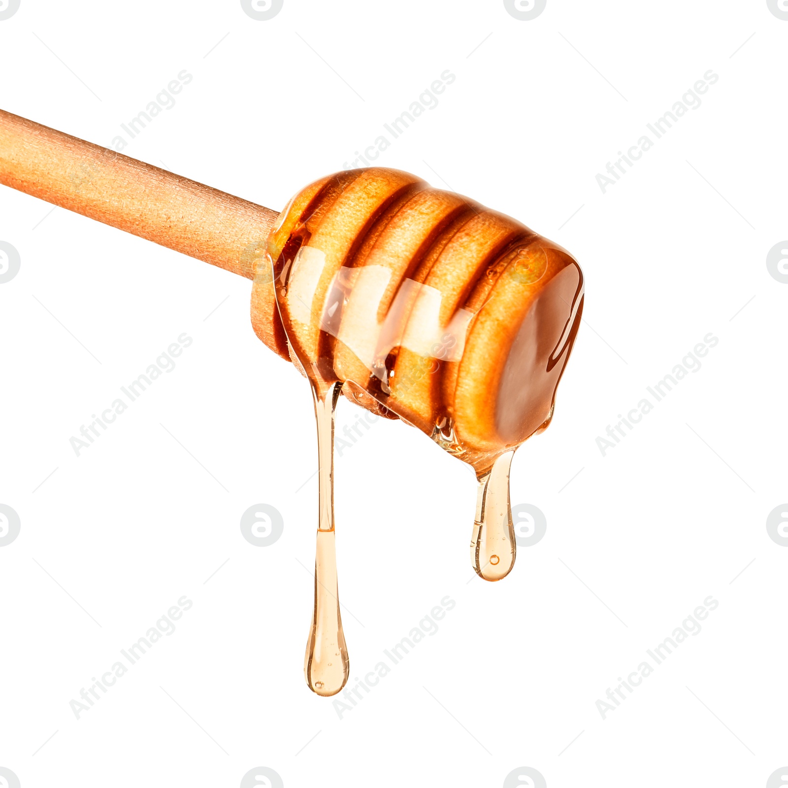 Image of Natural honey dripping from dipper on white background