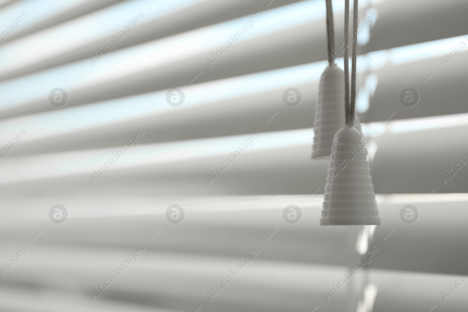 Photo of Closeup view of closed horizontal window blinds