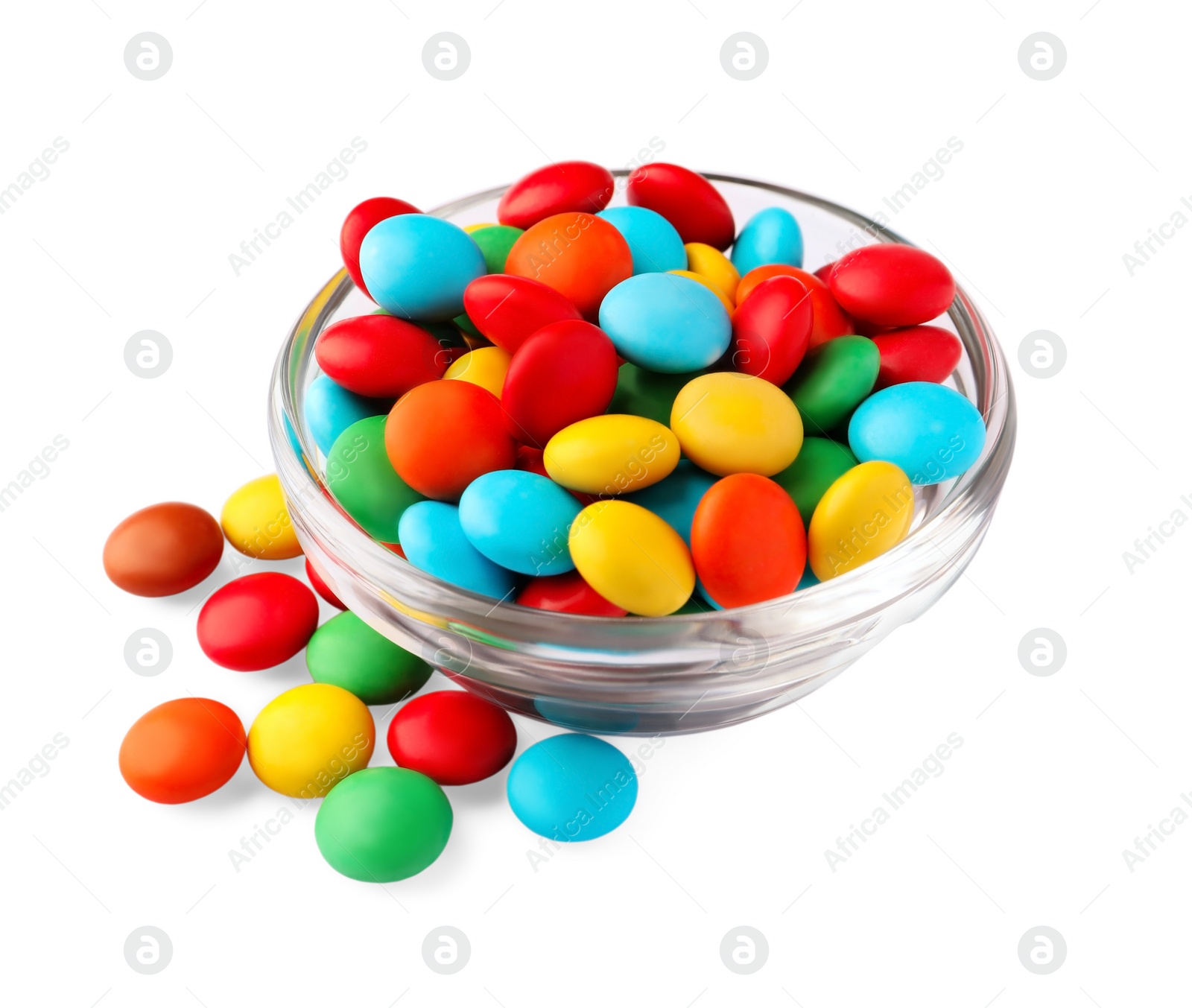 Photo of Bowl with colorful candies on white background