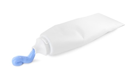 Photo of Tube with toothpaste on white background. Dental care