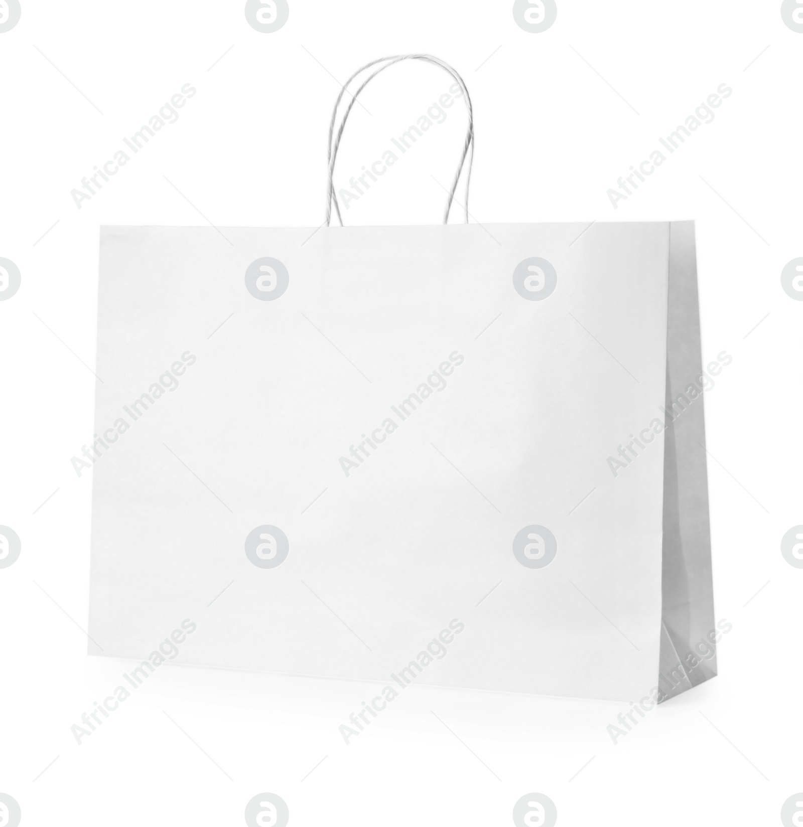 Photo of One paper bag isolated on white. Mockup for design