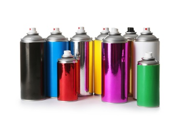 Cans of different spray paints on white background