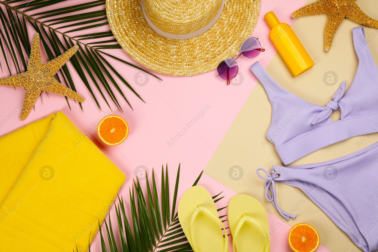 Photo of Frame of beach objects on color background, flat lay. Space for text