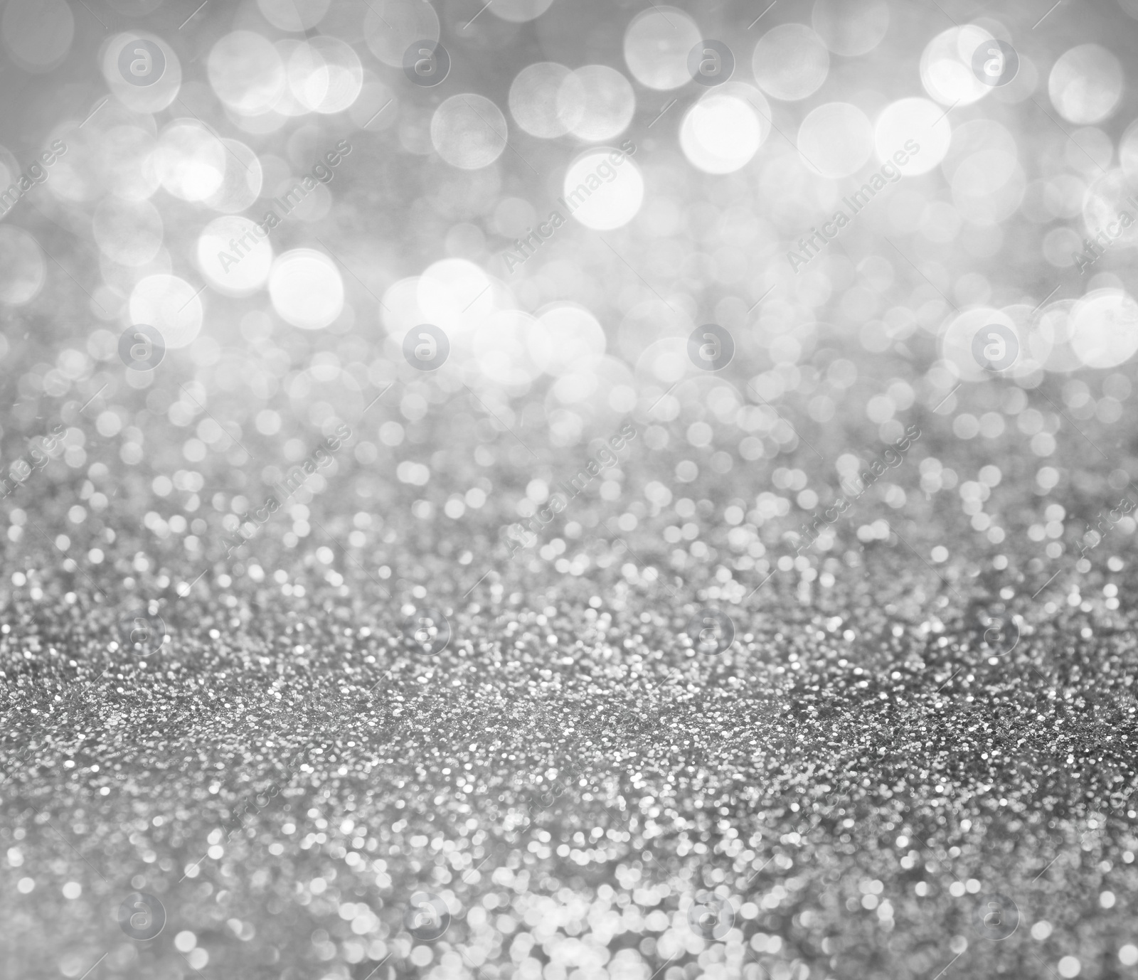 Image of Shiny silver glitter as background. Bokeh effect