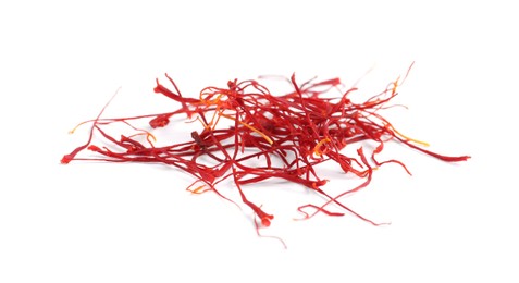 Photo of Heap of aromatic saffron on white background