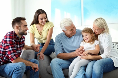 Photo of Happy family at home. Reunion of generations