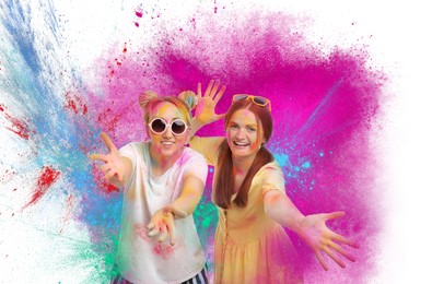 Image of Holi festival celebration. Happy women covered with colorful powder dyes on white background