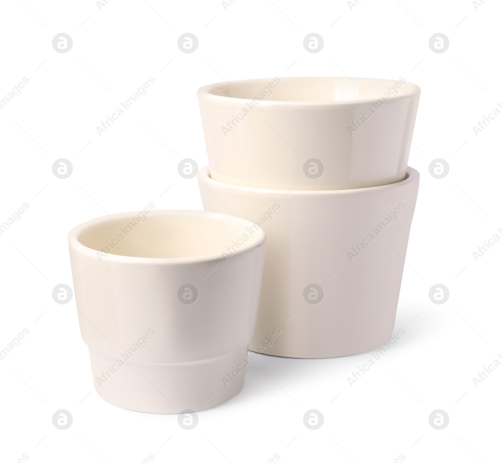 Photo of Empty ceramic flower pots on white background