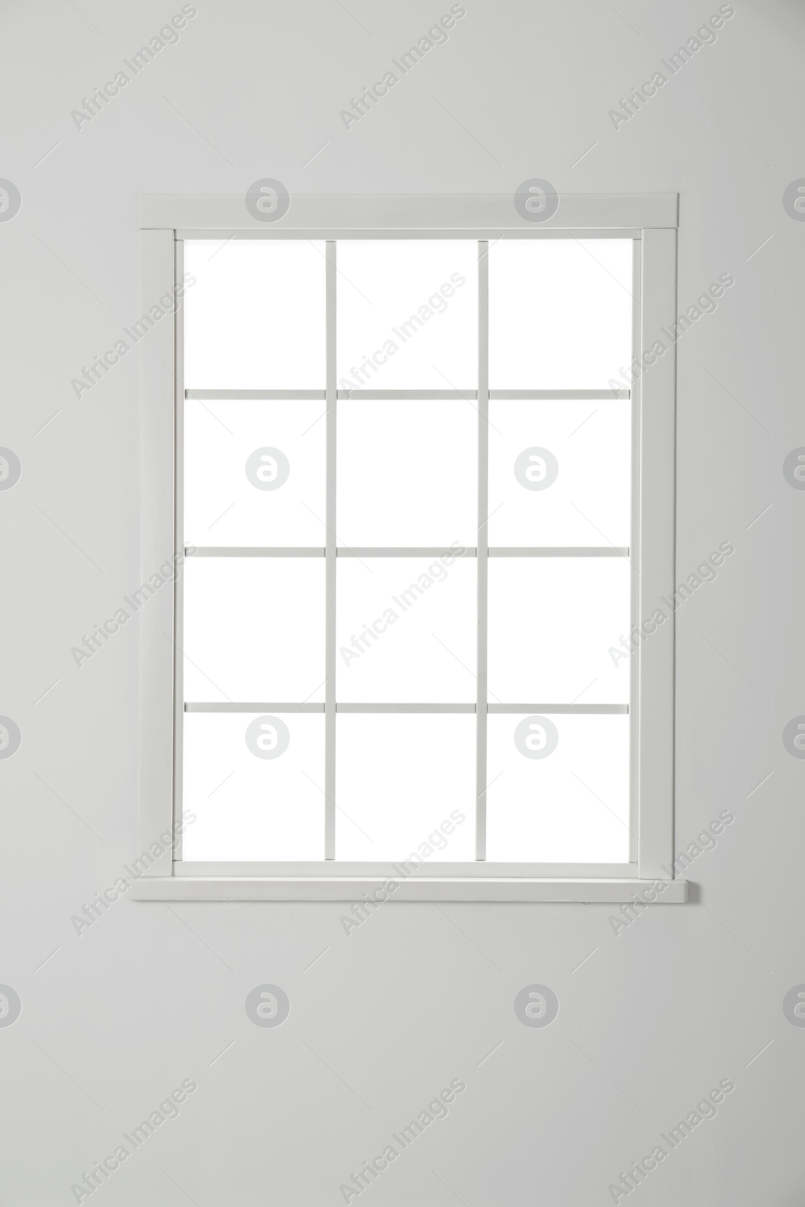 Photo of Empty white wall with window. Home interior