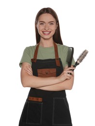 Portrait of happy hairdresser with brushes on white background