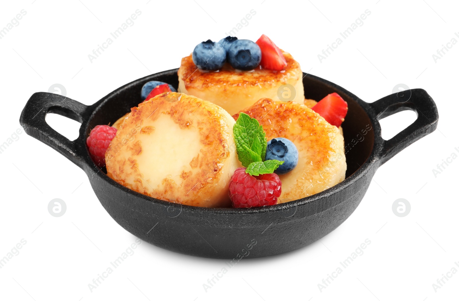 Photo of Delicious cottage cheese pancakes with fresh berries and honey on white background