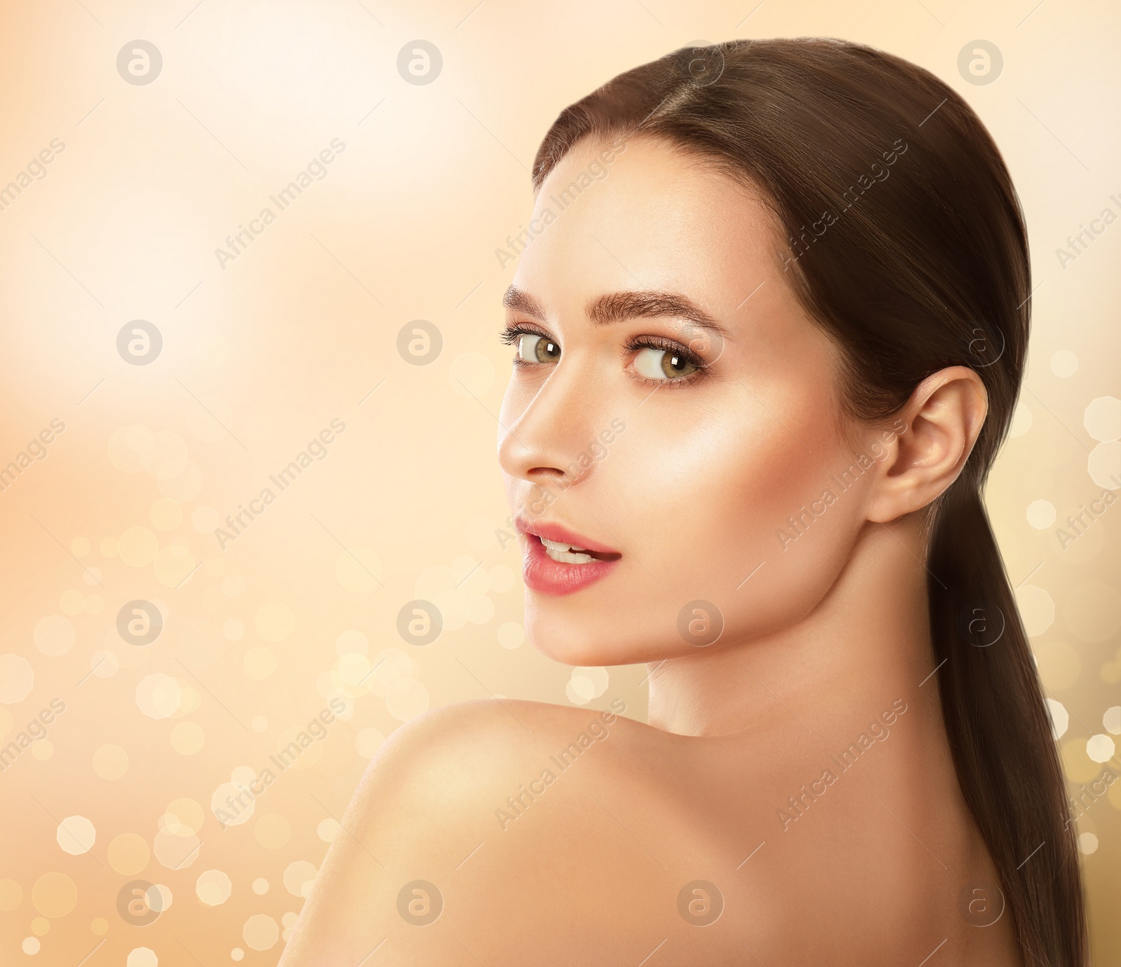 Image of Beautiful young woman with silky skin on light background. Spa portrait