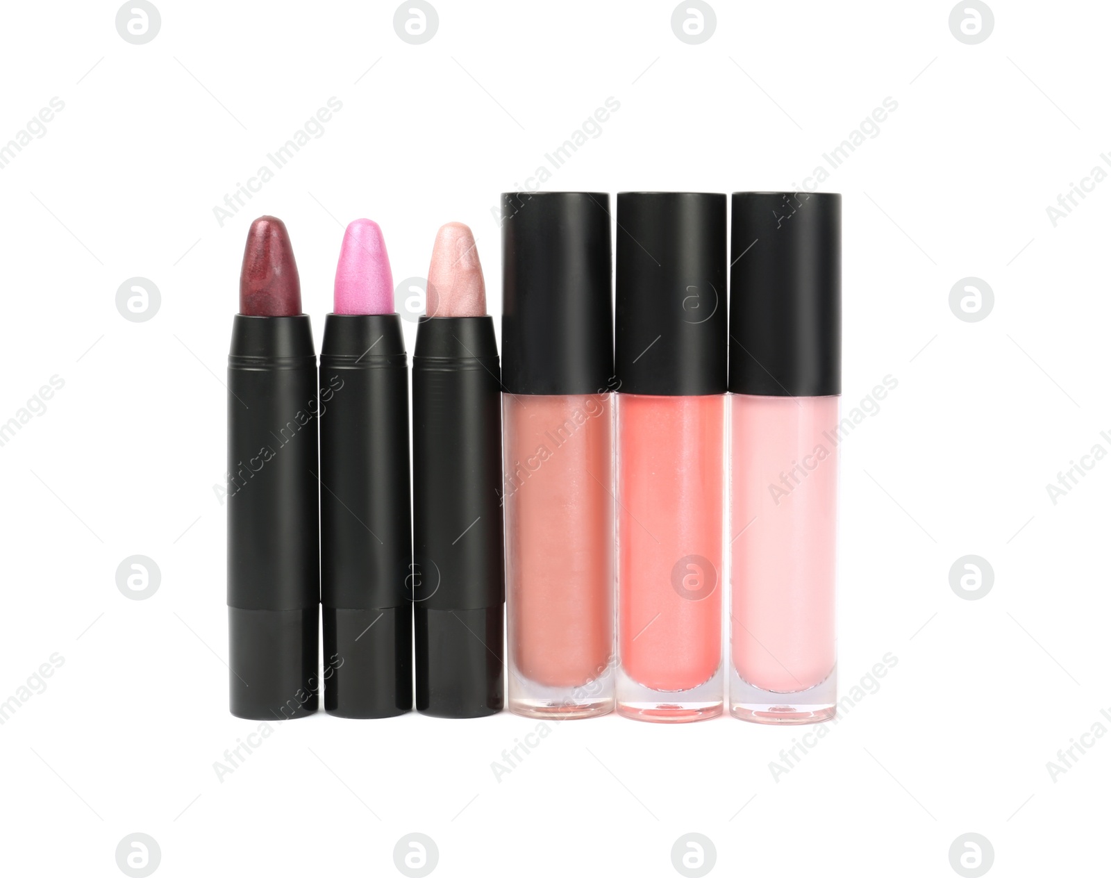 Photo of Set of colorful lipsticks isolated on white