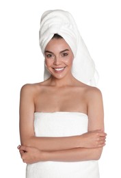 Photo of Beautiful young woman with towels on white background