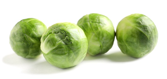 Photo of Fresh tasty Brussels sprouts on white background