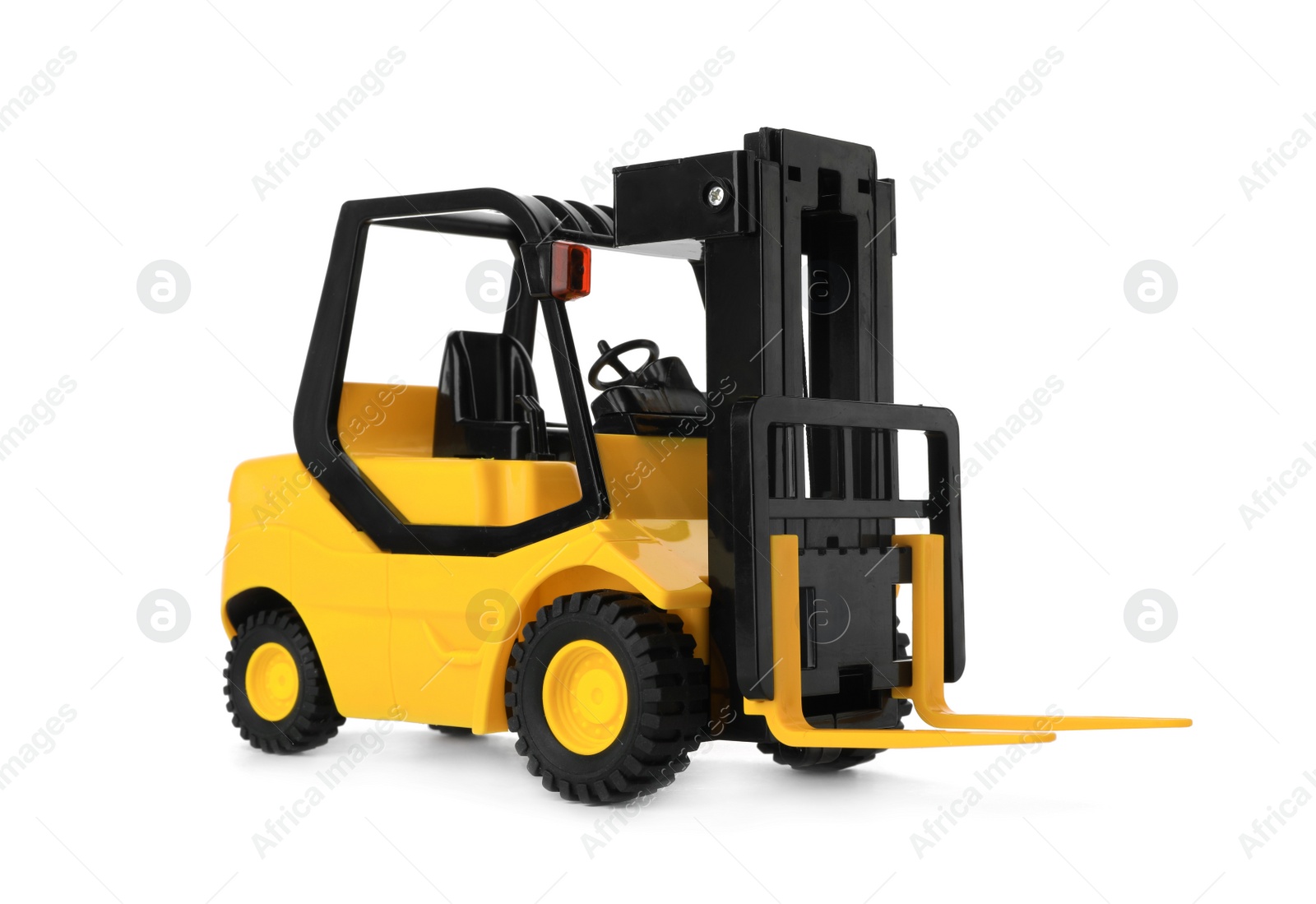 Photo of Toy forklift isolated on white. Logistics and wholesale concept