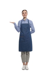Photo of Beautiful young woman in clean denim apron on white background