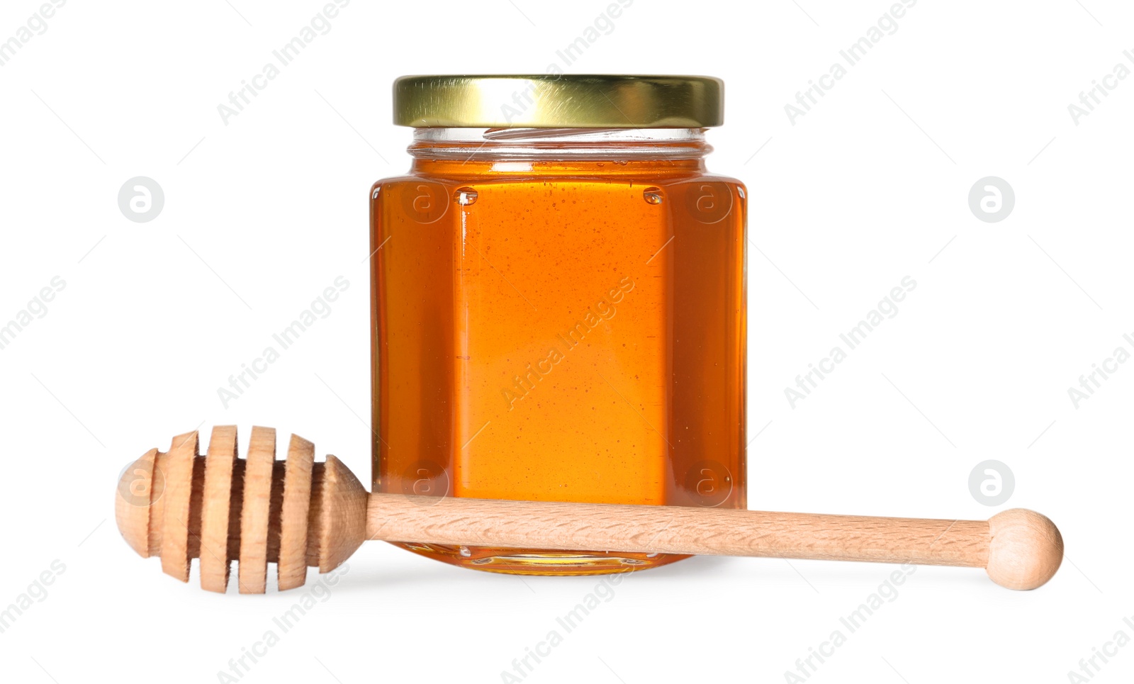 Photo of Tasty natural honey in glass jar and dipper isolated on white