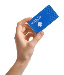 Photo of Woman holding business card isolated on white, closeup. Medical service