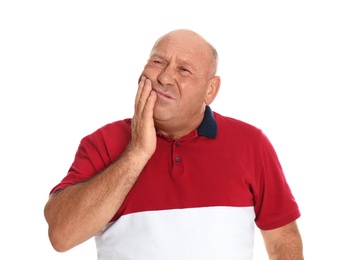 Photo of Mature man suffering from toothache on white background