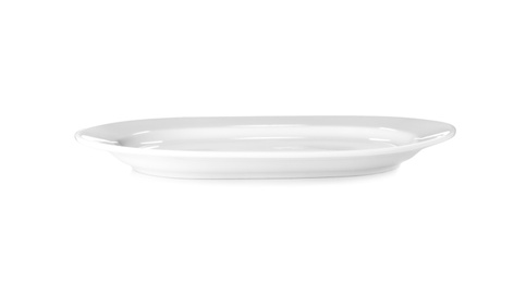 Photo of Ceramic plate on white background. Washing dishes