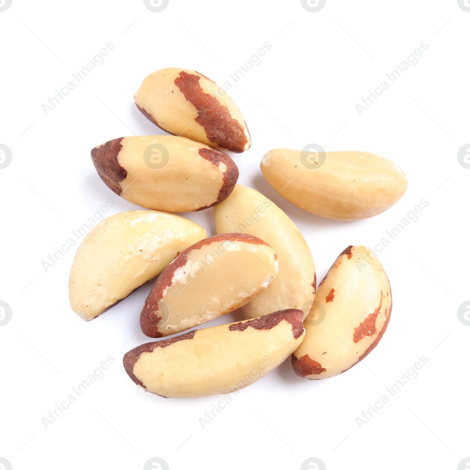 Photo of Delicious Brazil nuts on white background, top view