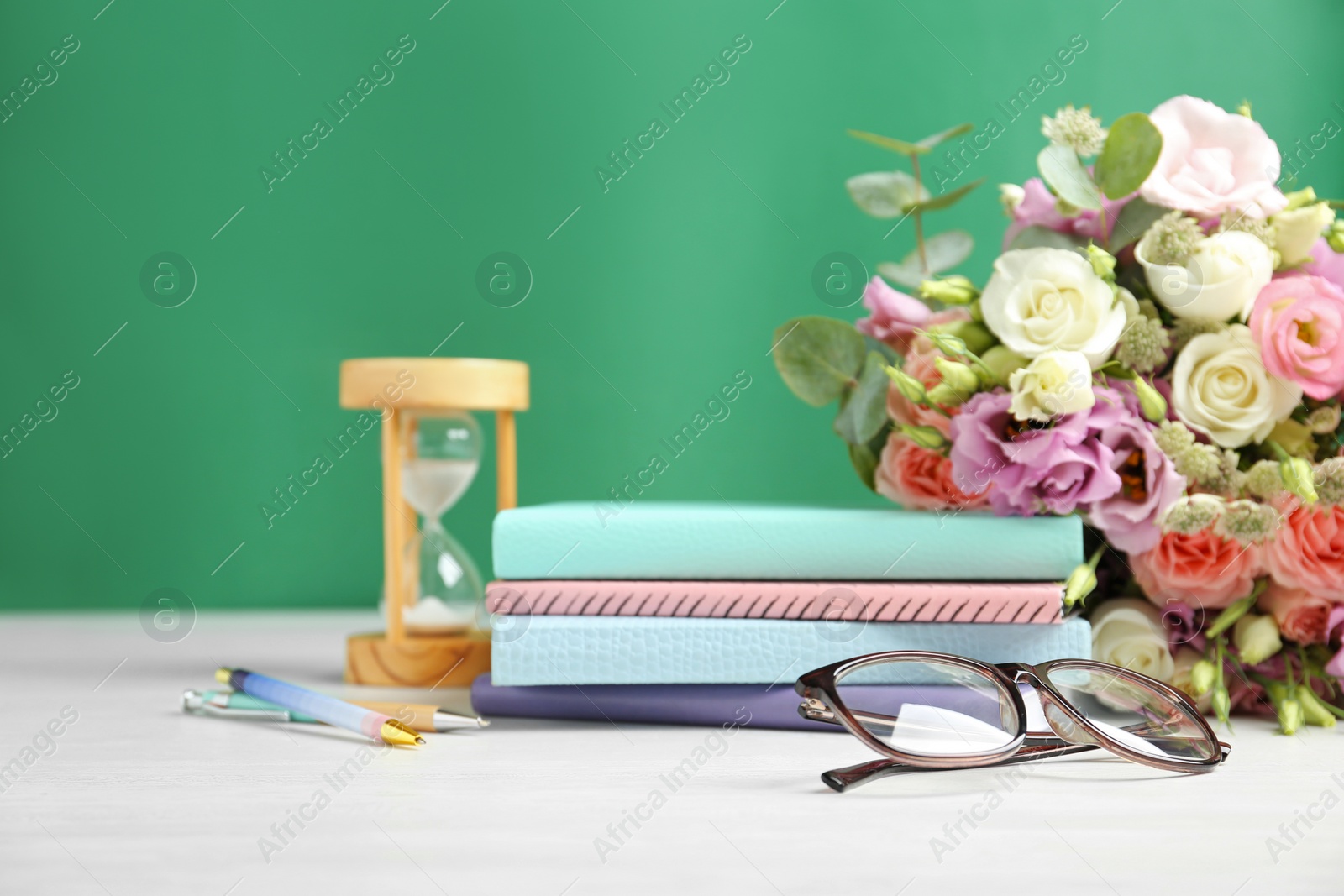 Photo of Composition with flowers for Teacher's day on white table