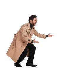 Handsome man greeting someone on white background