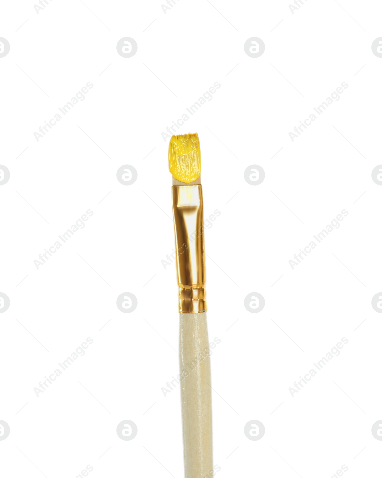 Photo of Brush with yellow paint on white background