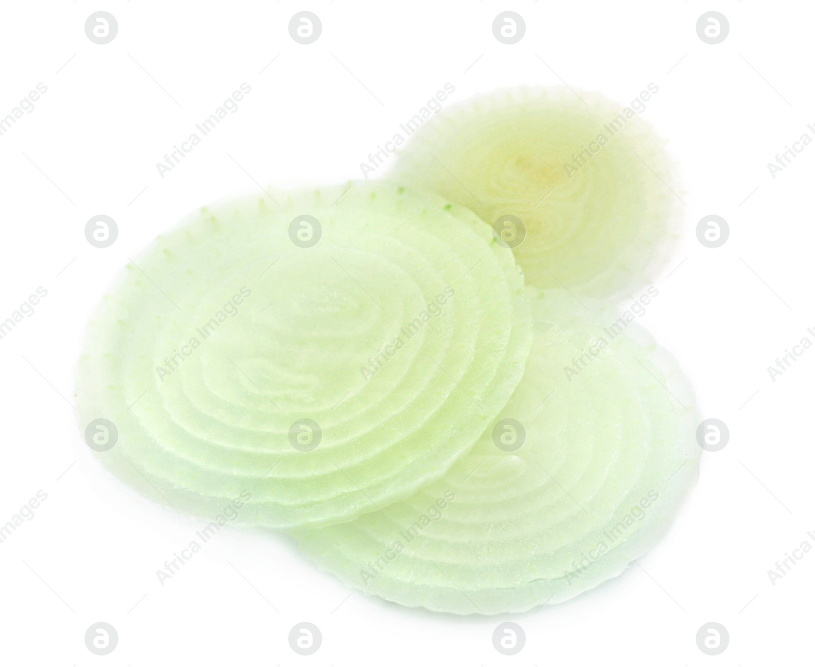 Photo of Slices of fresh ripe onion on white background