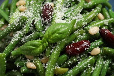 Photo of Tasty salad with green beans as background, closeup view
