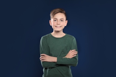 Photo of Portrait of little boy on color background