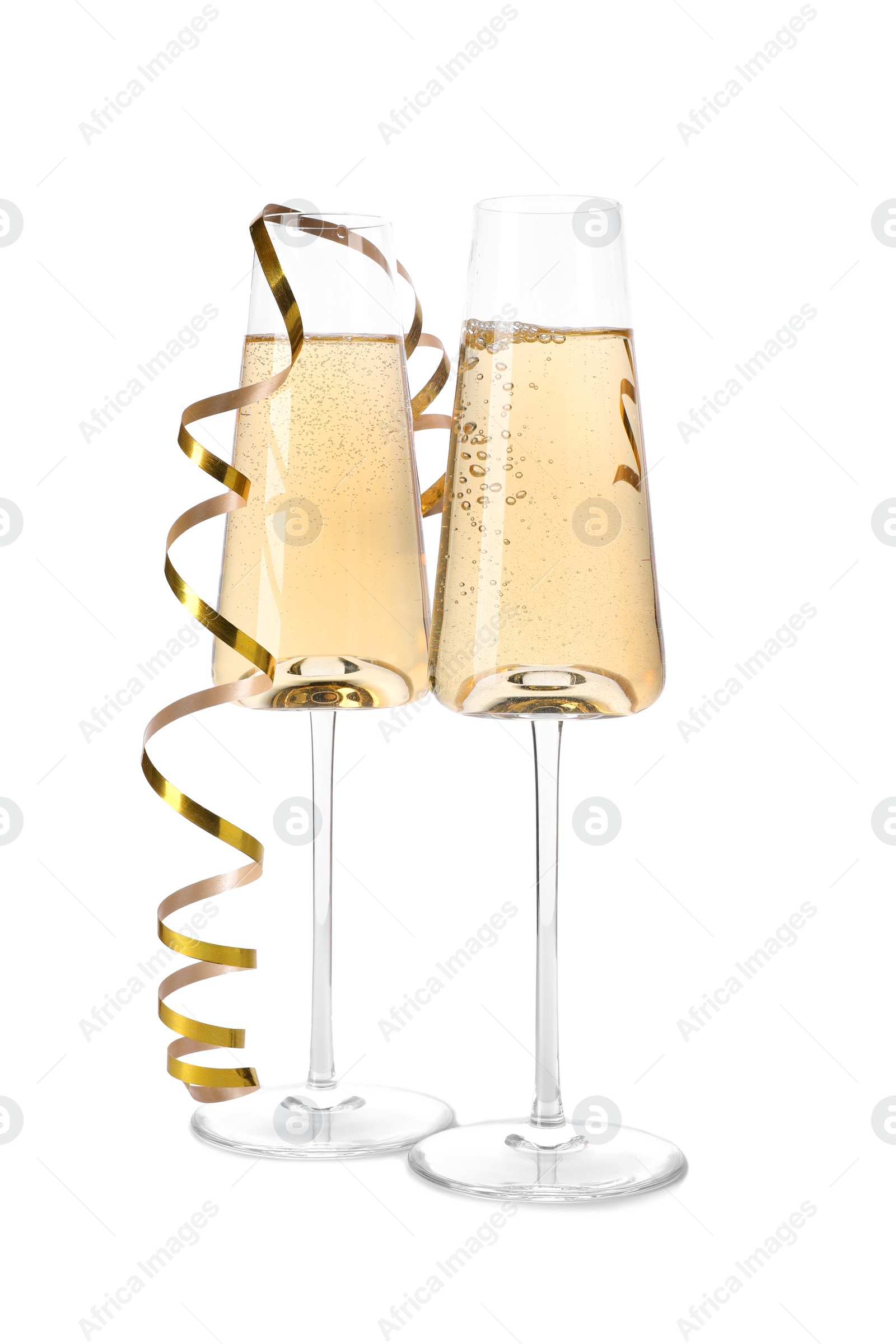 Photo of Glasses of champagne on white background. Festive drink