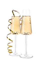 Glasses of champagne on white background. Festive drink