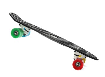 Photo of Black skateboard with colorful wheels isolated on white