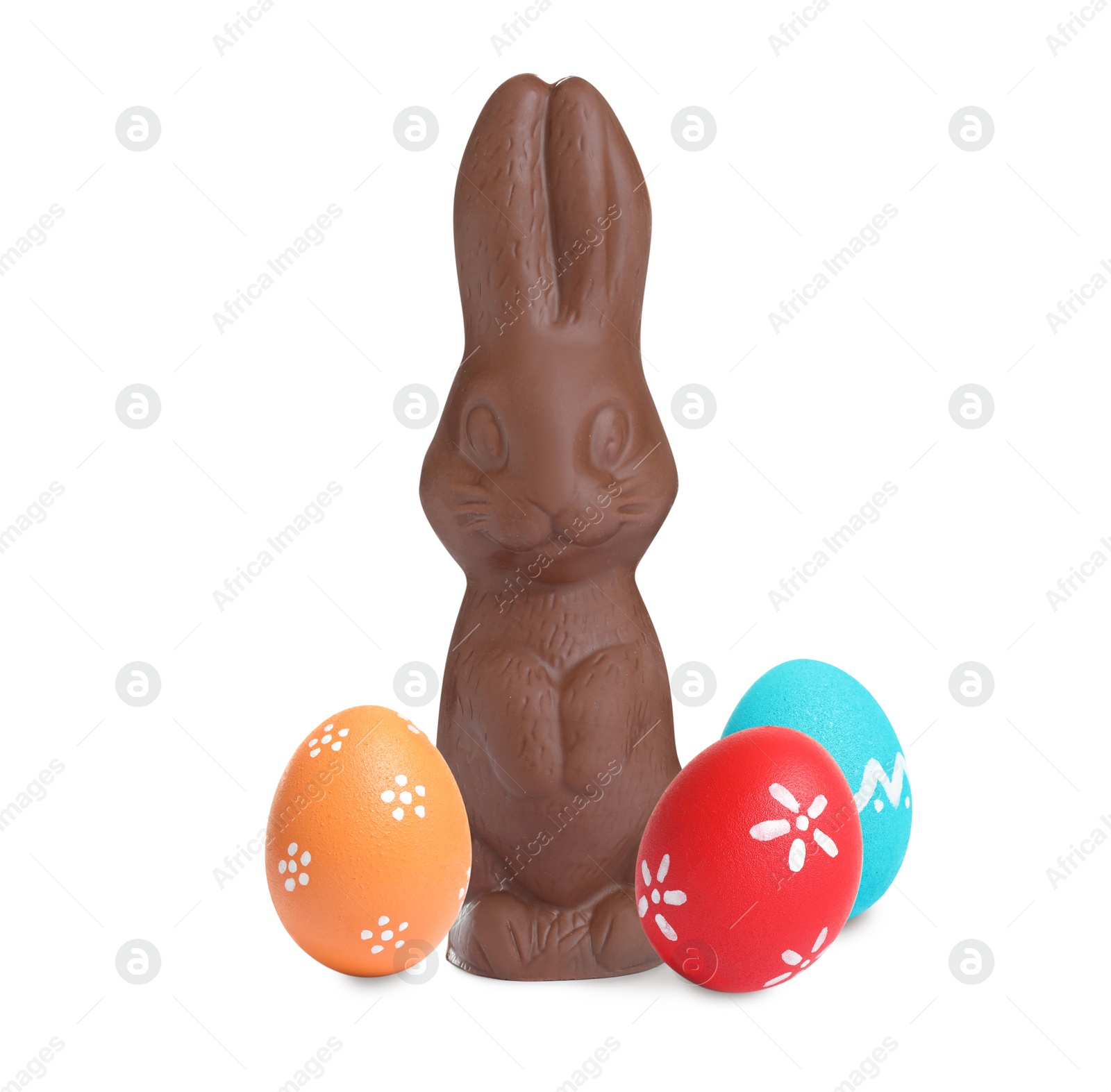 Image of Chocolate bunny and painted Easter eggs on white background