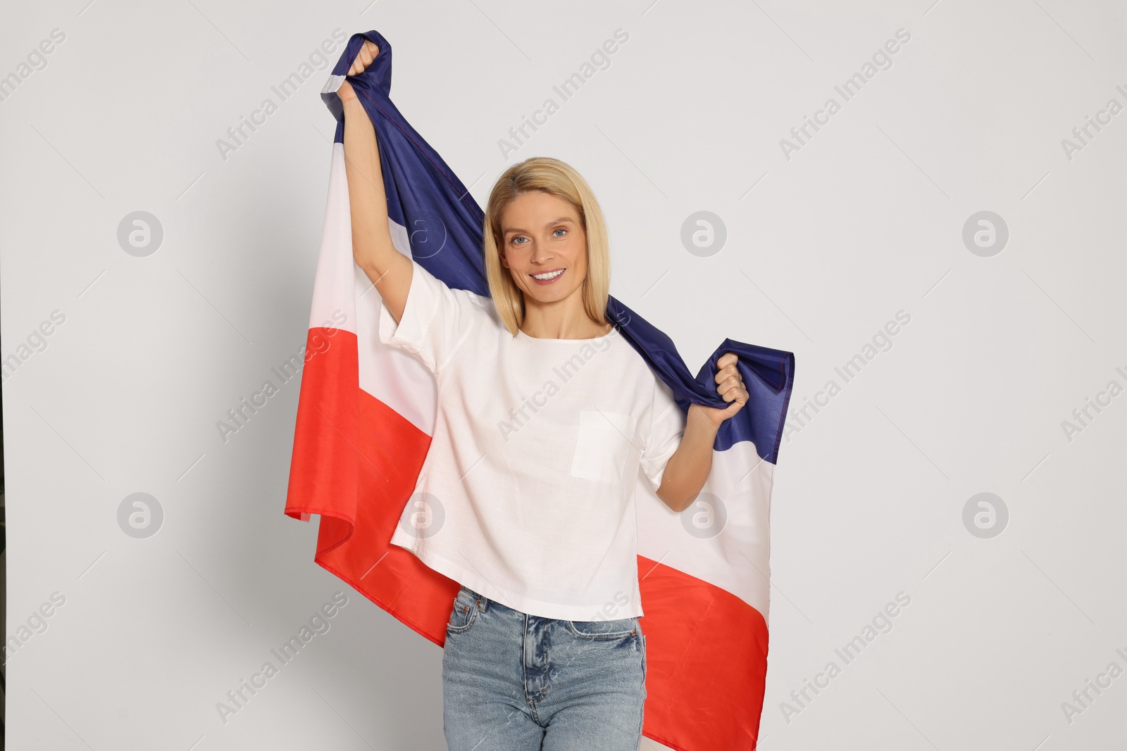 Photo of Woman with flag of Netherlands on white background