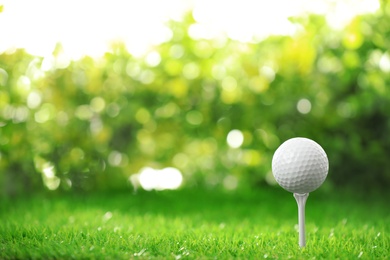 Photo of Golf ball on tee at green course