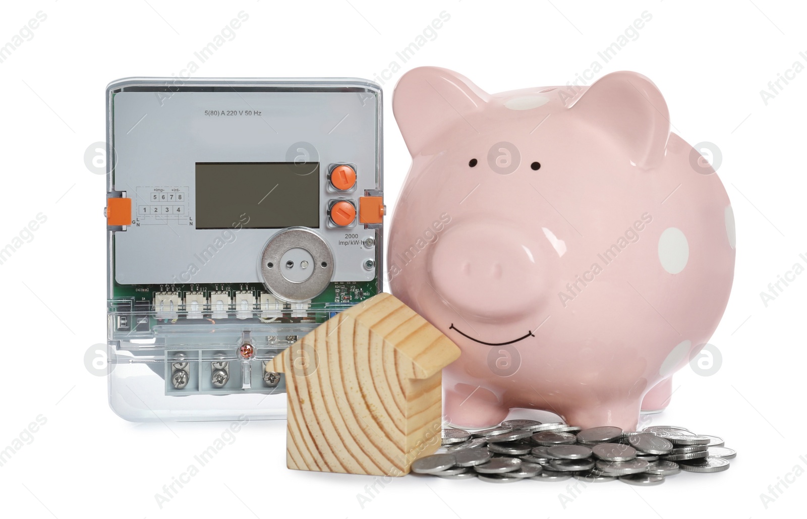 Photo of Electricity meter, house model, piggy bank and coins on white background