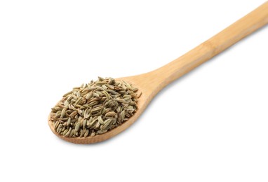 Dry fennel seeds in spoon isolated on white