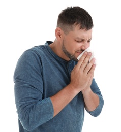 Man suffering from allergy on white background