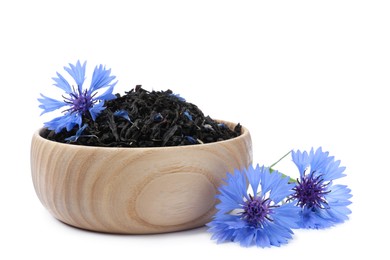 Dried cornflower tea and fresh flowers on white background