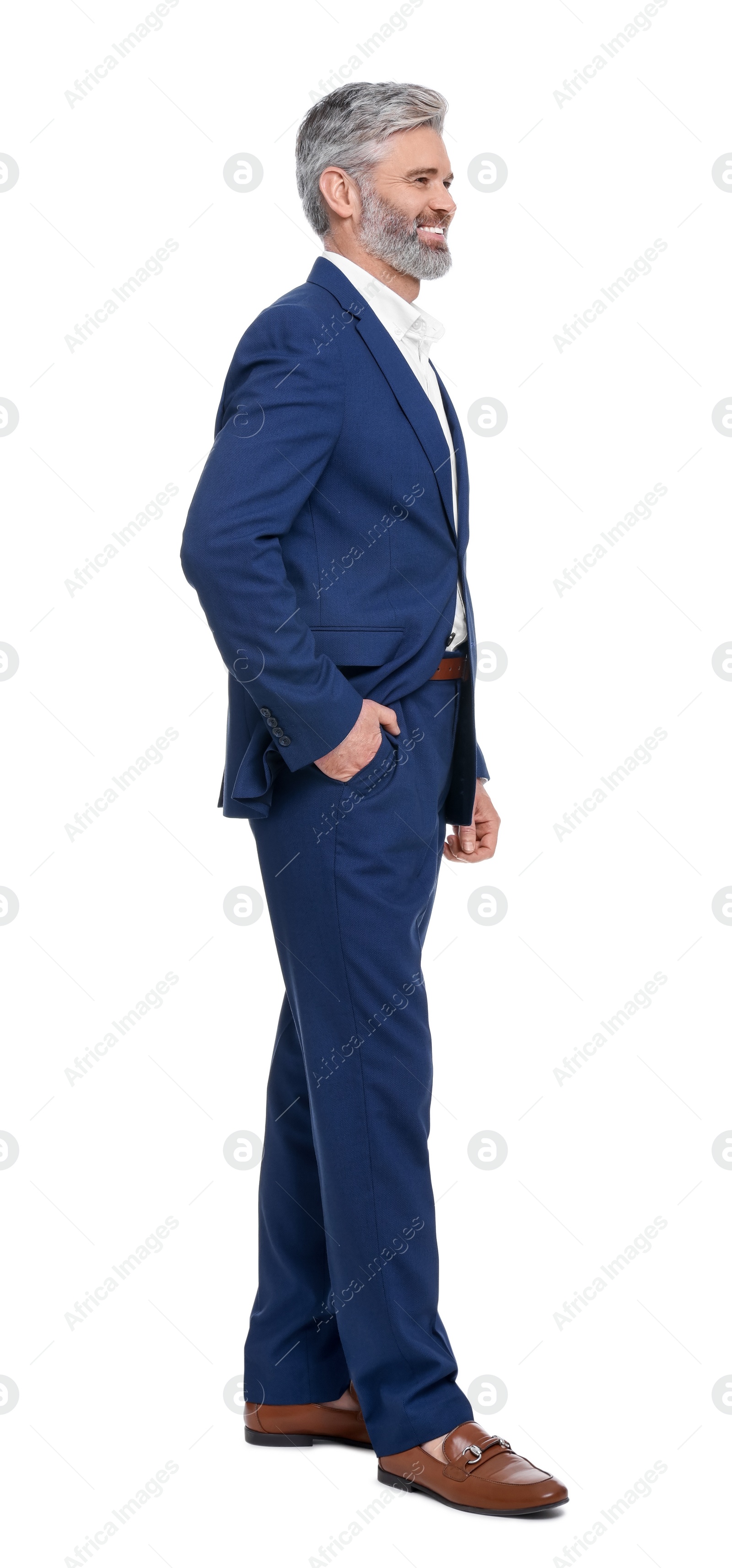 Photo of Mature businessman in stylish clothes posing on white background