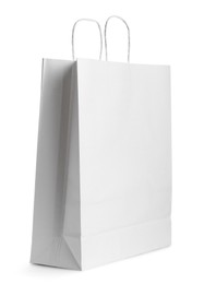Photo of One paper bag isolated on white. Mockup for design