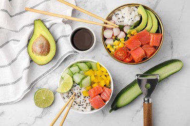 Delicious poke bowls with different ingredients on white marble table, flat lay