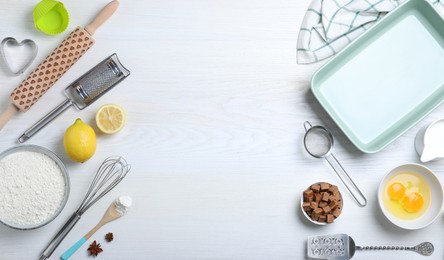 Photo of Cooking utensils and ingredients on white wooden table, flat lay. Space for text