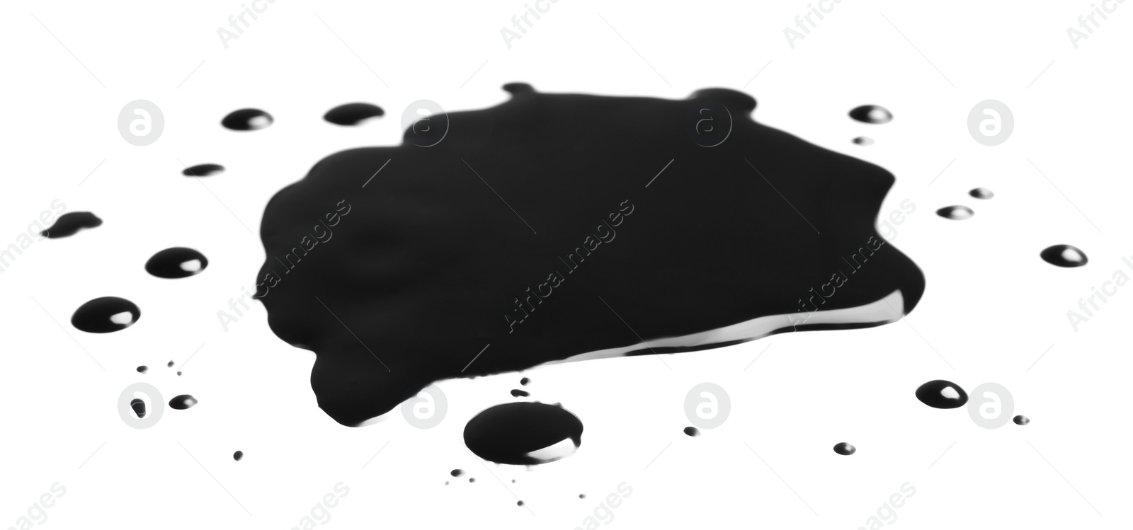 Photo of Blots of black paint on white background