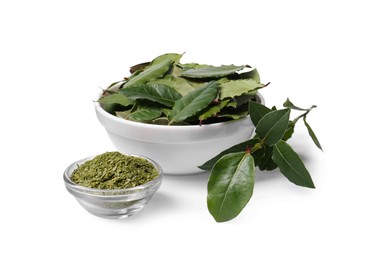 Photo of Bowls with fresh and ground bay leaves on white background